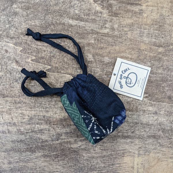 The TOMI Mini Drawstring Bag: Boro Patchwork Print in Blue