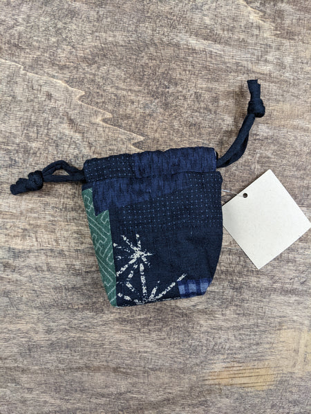 The TOMI Mini Drawstring Bag: Boro Patchwork Print in Blue