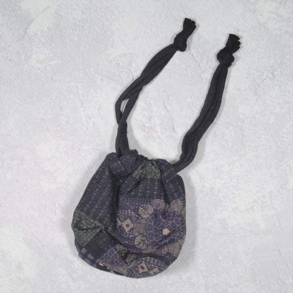 The TOMI Mini Drawstring Bag: Boro Patchwork Print in Blue