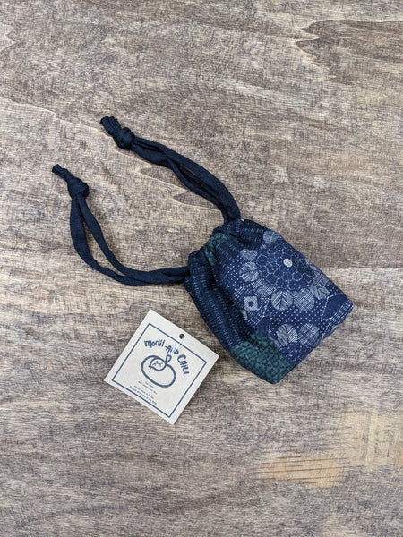 The TOMI Mini Drawstring Bag: Boro Patchwork Print in Blue