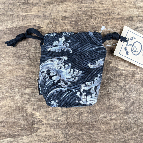 The TOMI Mini Drawstring Bag: Dark Gray Waves