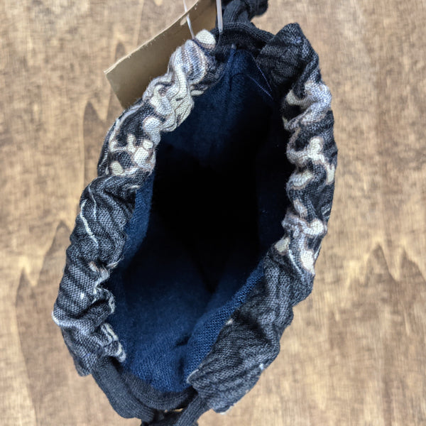 The TOMI Mini Drawstring Bag: Dark Gray Waves