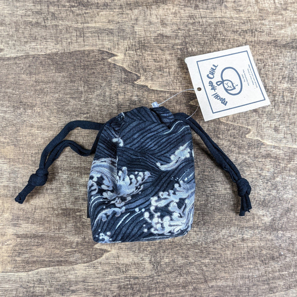 The TOMI Mini Drawstring Bag: Dark Gray Waves