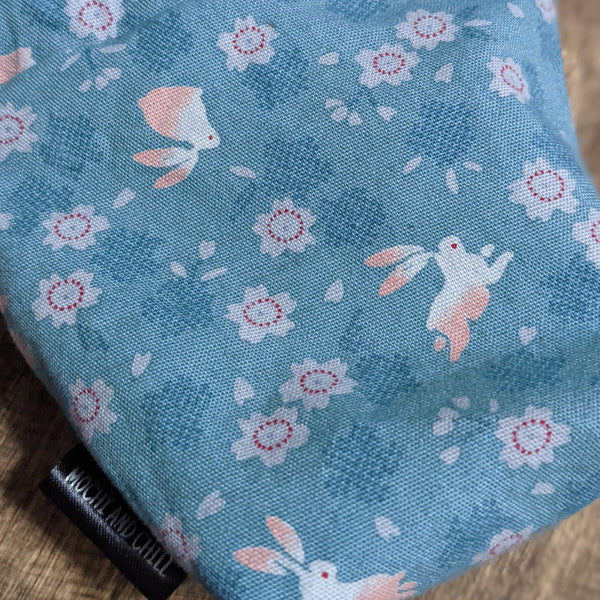 The TOMI Mini Drawstring Bag: Bunnies & Blossoms