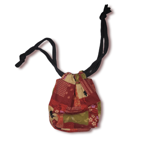 THE TOMI Mini Drawstring Bag: Red & Green Patchwork Print with Black Cats