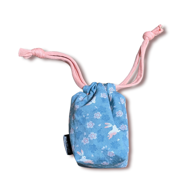 The TOMI Mini Drawstring Bag: Bunnies & Blossoms